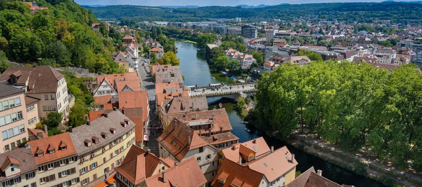 View from the Tübingen collegiate church tower via Tübingen‘s old town to the Neckar river. Baden Wuerttemberg, Germany, Europe
