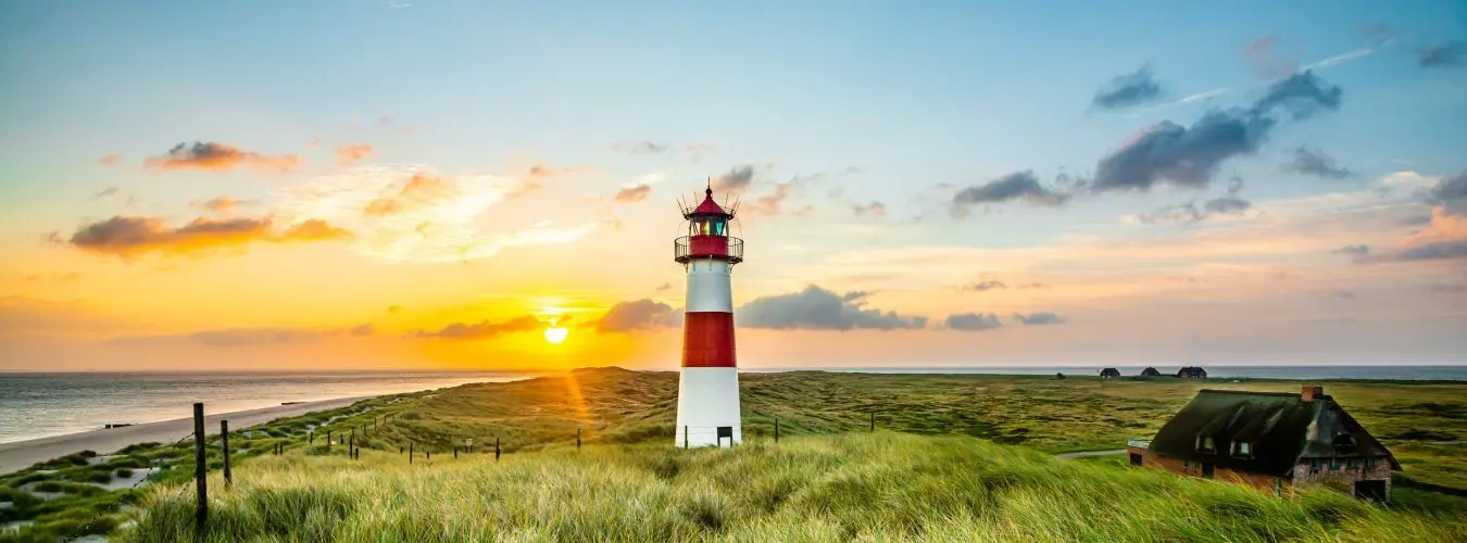 Thatched roof house on the coast